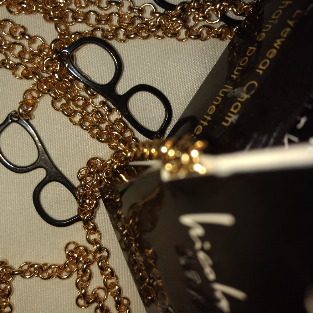 Nicole Miller eyeglass chain(s)